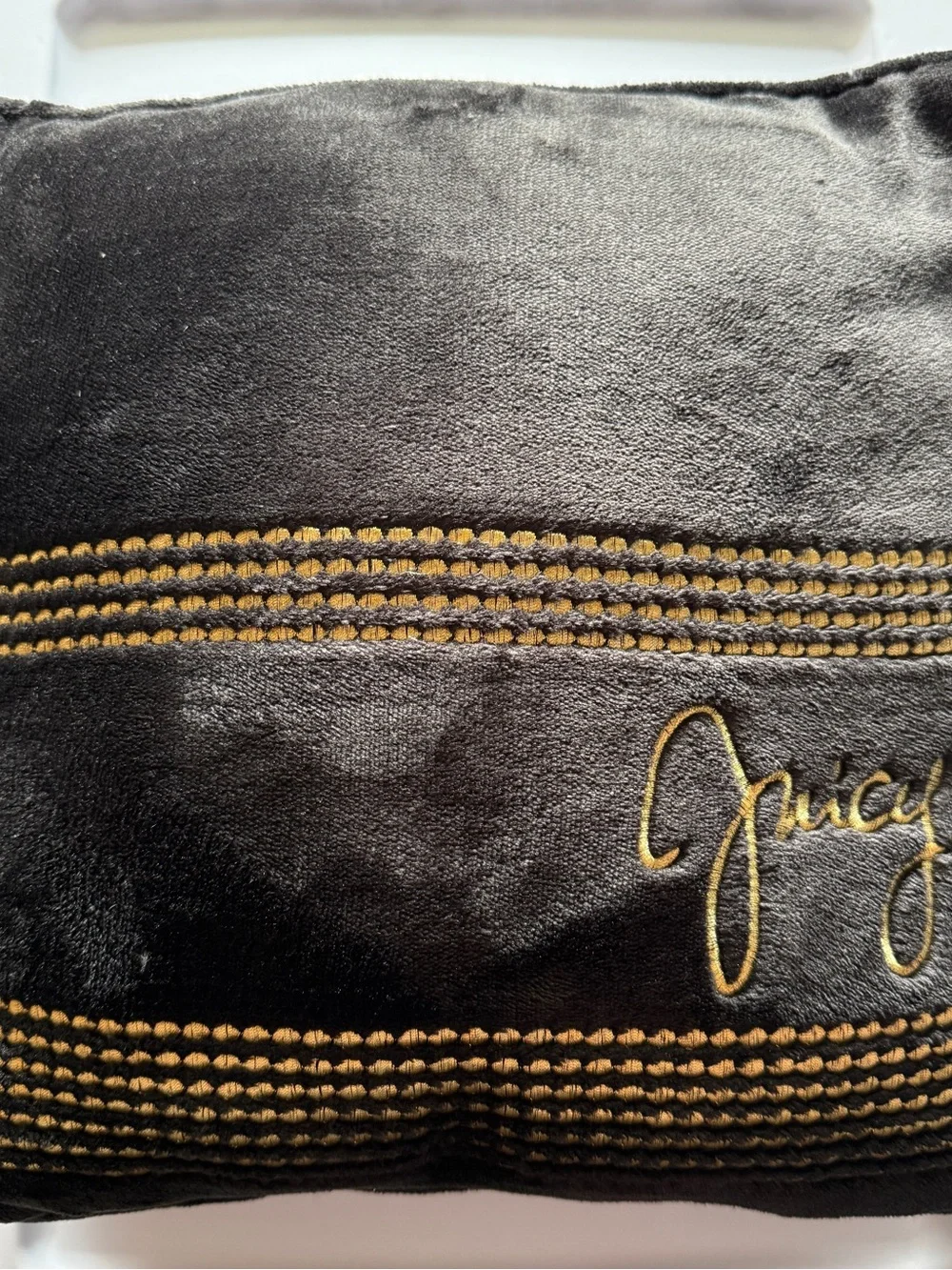 Juicy Couture Black Velour Decorative Pillow with Gold Stitching